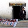Butcher with yak meat in Nyalam, Tibet