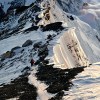 Between the steps: Climbers on summitridge of Everest