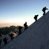 Row of climbers on Mt Blanc, France