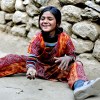 Girl playing with rocks, Phakding, Nepal
