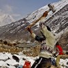 Construction in Nepal: men crushing rocks