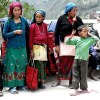 Nepali porter family on Friendship Bridge
