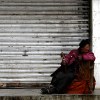 Praying woman in Xigar, Tibet