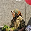 Russian lady selling vegetables on the market