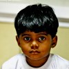 Little boy in train, India