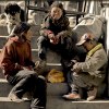 Street kids in Nyalam, Tibet emptying jam jars