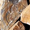 Buddha image in mani stones pile
