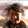 Tibetan girl with hair blowing
