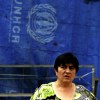 Russian lady on the market with UNHCR cover