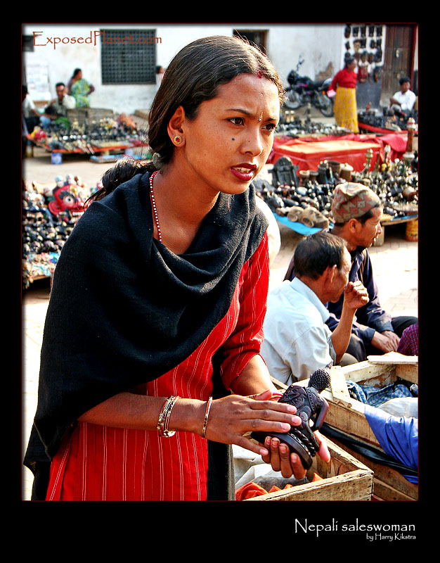Nepali girl selling stuff at Kathmandu market