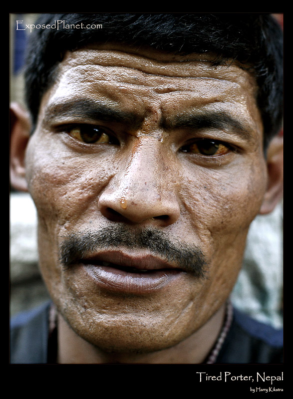 Tired Nepali porter