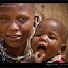 Photo of Merry X-mas, Maasai child with mother, Tanzania on ExposedPlanet.com