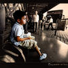 Photo of Boy waitin on a bus in Mendoza, Argentina on ExposedPlanet.com