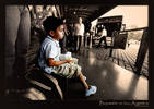 Boy waitin on a bus in Mendoza, Argentina
