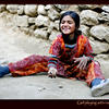 Photo of Girl playing with rocks, Phakding, Nepal on ExposedPlanet.com