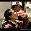 Photo of Globalisation (8): kid on coke in Tibet on ExposedPlanet.com