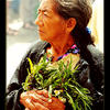 Photo of Woman with flowers in Guatemala on ExposedPlanet.com
