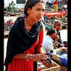 Nepali girl selling stuff at Kathmandu market