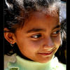 Photo of Nepali girl with earring in Kathmandu on ExposedPlanet.com
