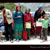 Nepali porter family on Friendship Bridge