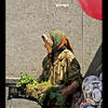 Photo of Russian lady selling vegetables on the market on ExposedPlanet.com