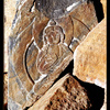 Buddha image in mani stones pile