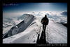 Climber descending on the summit ridge of Denali, Alaska USA