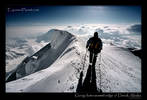 Climber descending on the summit ridge of Denali, Alaska USA