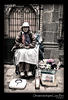 Tipping the scales: Woman selling stuff on the streets of Cusco, Peru