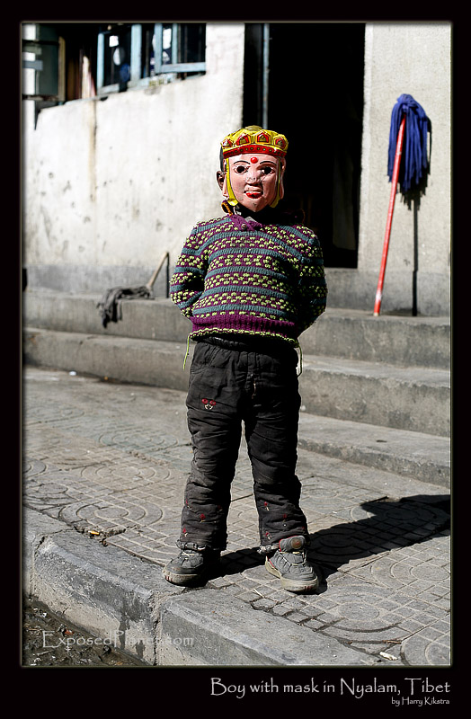 Masked child in Nyalam, Tibet