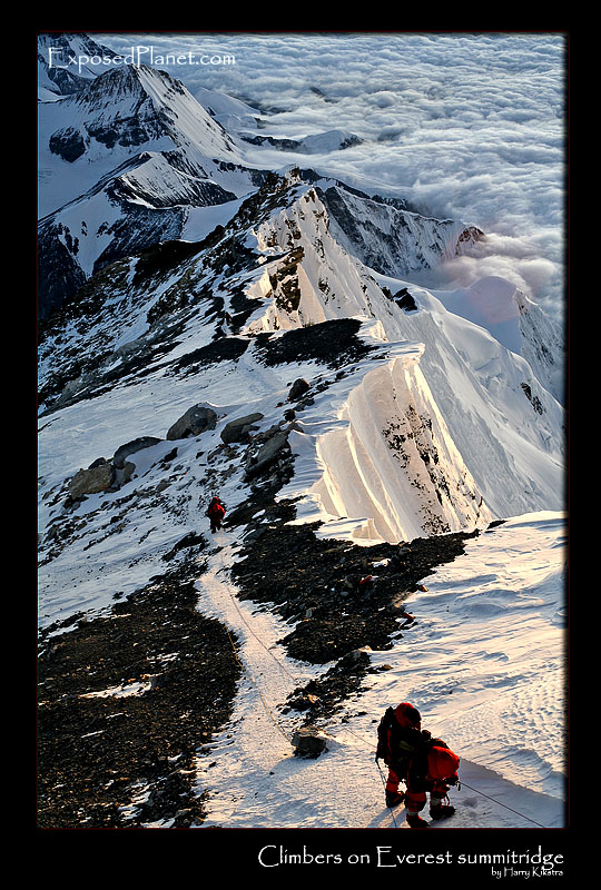 Between the steps: Climbers on summitridge of Everest