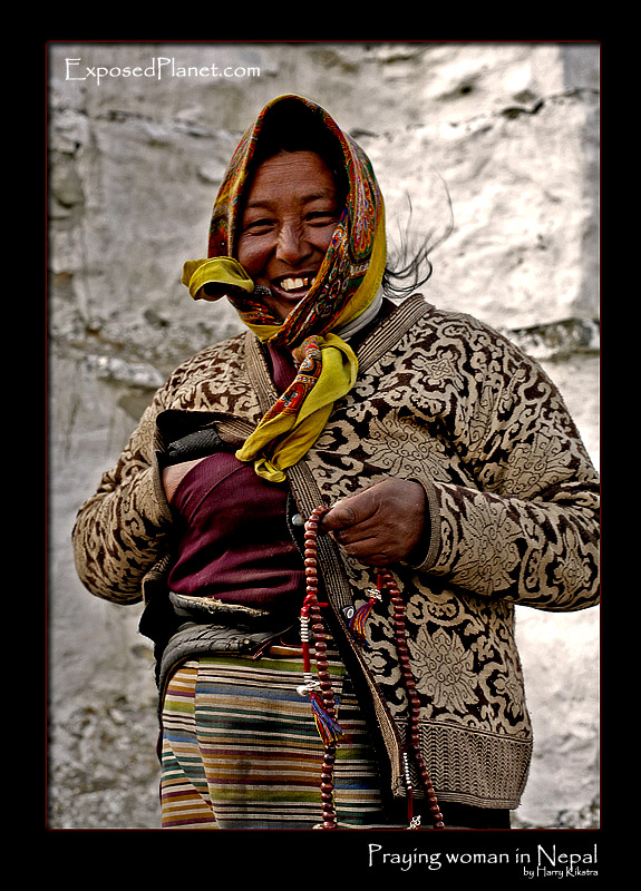 Praying woman in Nepal