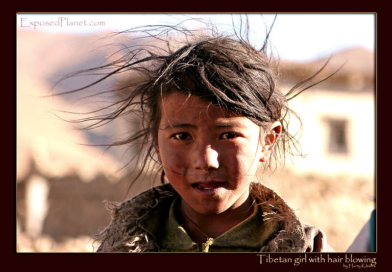Tibetan girl with hair blowing